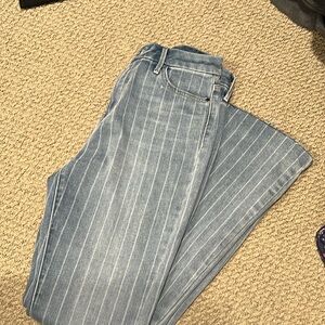 Joes bootleg size 29 light wash with white stripes distressed bottom